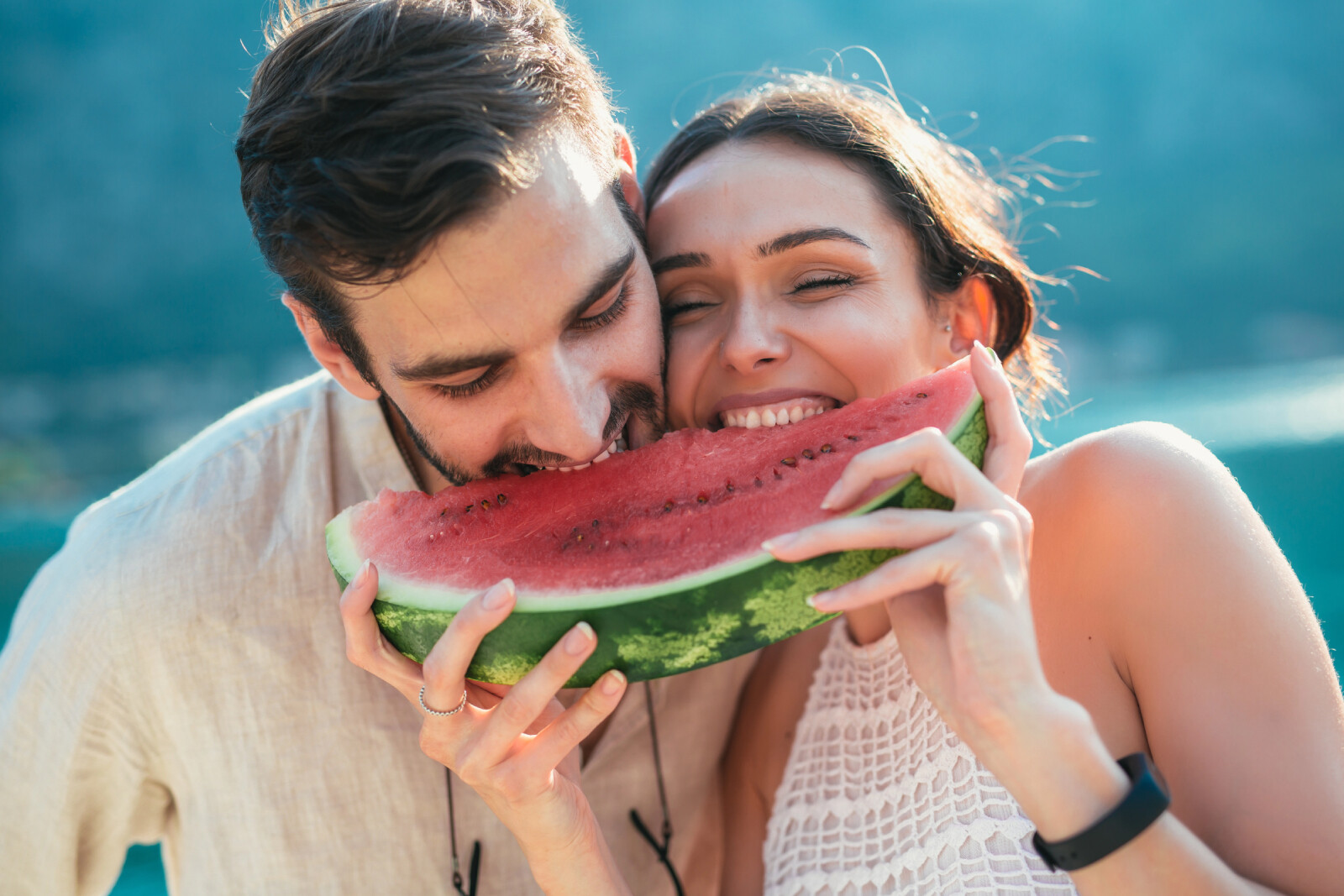 How Fruitarian Videos Can Help You Learn About and Transition to a Fruitarian Diet - couple sharing watermelon - Fruitarian Videos